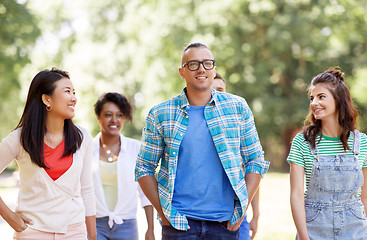 Image showing group of happy international friends in park