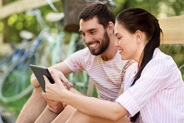 Image showing couple with tablet pc and bicycles at summer park