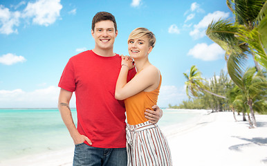 Image showing happy couple hugging over white background