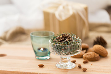 Image showing christmas fir decoration with cone in dessert bowl