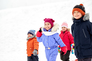 Image showing happy little kids outdoors in winter