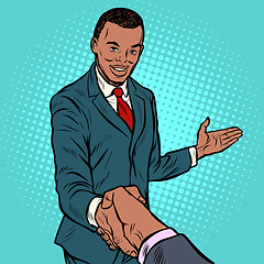 Image showing African businessman shaking hands