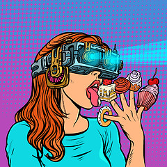 Image showing woman in virtual reality glasses eating sweets