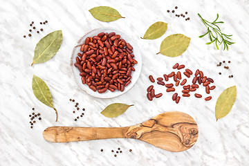 Image showing Red beans and spices on marble background