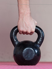 Image showing Black kettlebell ina gym