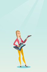 Image showing Woman playing the electric guitar.