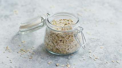 Image showing Glass jar with raw oats