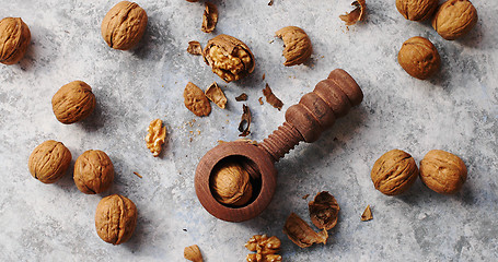 Image showing Wooden cracker with walnuts in composition