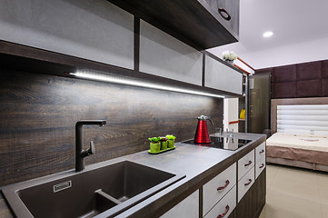 Image showing Luxury modern bkrown kitchen