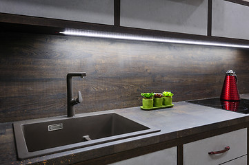 Image showing Luxury modern bkrown kitchen