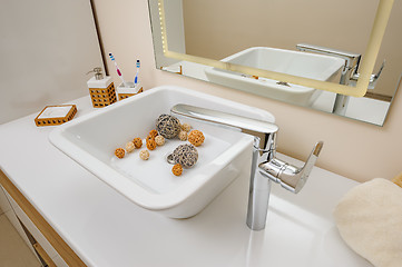 Image showing Bathroom interior detail with sink and faucet
