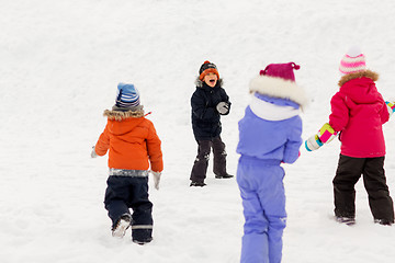 Image showing happy little kids playing outdoors in winter