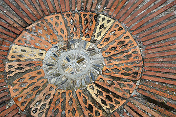 Image showing Cobble round mosaic. Patterned floor walkway in the park.