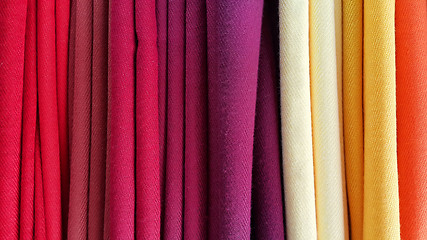 Image showing Bright multicolored background of fabrics