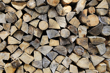 Image showing Firewood pile stacked chopped wood trunks