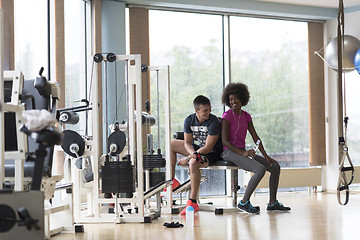 Image showing couple in a gym have break