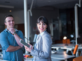 Image showing Business People Working With Tablet in office