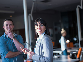 Image showing Business People Working With Tablet in office