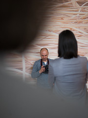 Image showing A young photographer at work