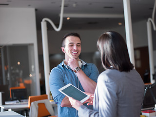 Image showing Business People Working With Tablet in office