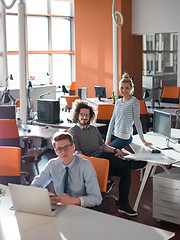 Image showing businessman working using a laptop in startup office