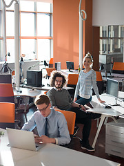 Image showing businessman working using a laptop in startup office