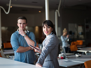 Image showing Business People Working With Tablet in office