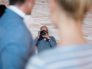 Image showing A young photographer at work