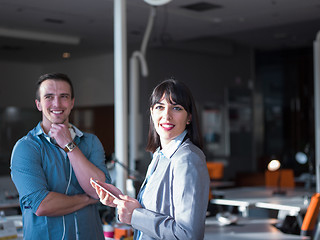 Image showing Business People Working With Tablet in office