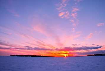 Image showing Winter sunset over frozen Baltic Sea in Finland