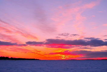 Image showing Winter sunset over frozen Baltic Sea in Finland