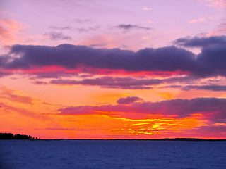 Image showing Winter sunset over frozen Baltic Sea in Finland