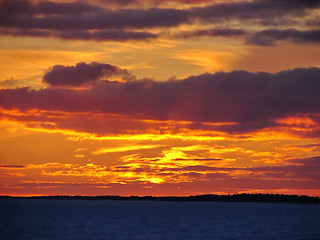 Image showing Winter sunset over frozen Baltic Sea in Finland