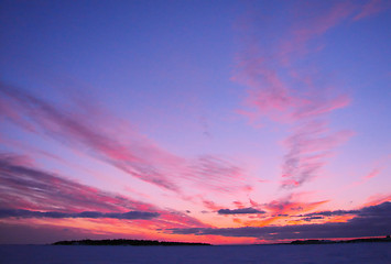 Image showing Winter sunset over frozen Baltic Sea in Finland