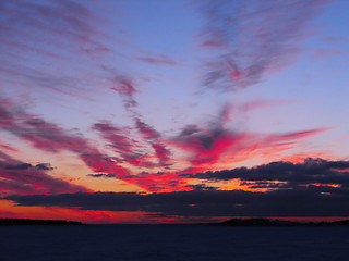 Image showing Winter sunset over frozen Baltic Sea in Finland