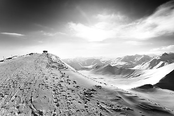 Image showing Black and white view on top station of ropeway in sun winter eve