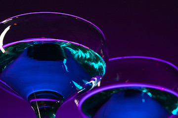 Image showing Two wine glasses standing on the table at studio