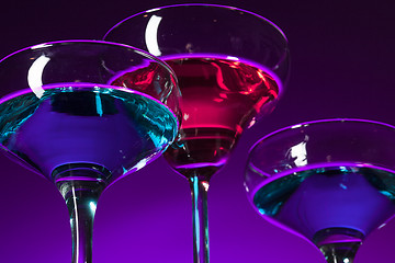 Image showing Three wine glasses standing on the table at studio