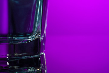 Image showing The water in glass on lilac background