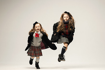 Image showing The fashion portrait of young beautiful teen girls at studio