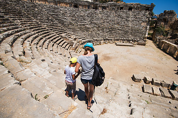 Image showing Young woman and her son at theatre