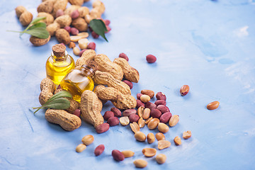 Image showing Natural peanut with oil in a glass