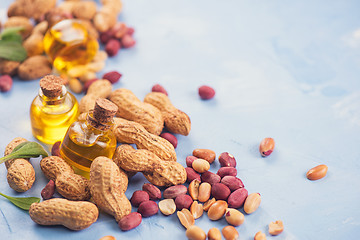 Image showing Natural peanut with oil in a glass