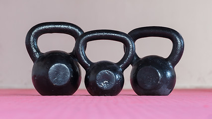 Image showing Black kettlebell ina gym