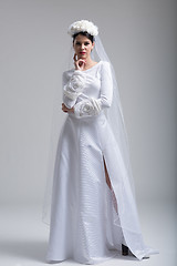 Image showing young bride in a wedding dress with a veil