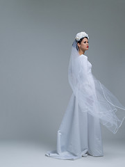 Image showing young bride in a wedding dress with a veil