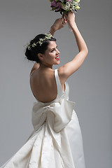 Image showing bride with a bouquet  isolated on white background