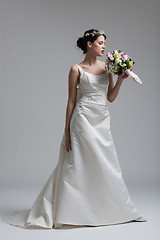 Image showing bride with a bouquet  isolated on white background