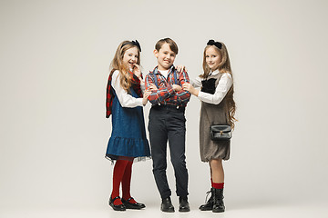 Image showing Cute stylish children on white studio background