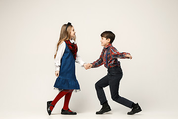 Image showing Cute stylish children on white studio background